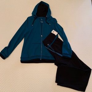 Black and teal warm up suit